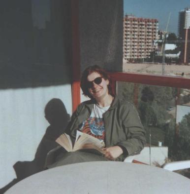 Me on balcony with book 17k